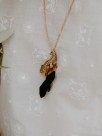 gold necklace leopard black feathers porcelain
