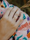 adjustable gold ring twisted with white flower
